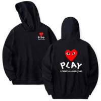 Dress with Confidence in Comme Des Garçons PLAY Cardigans