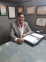 Dr. Navneet Dinodia